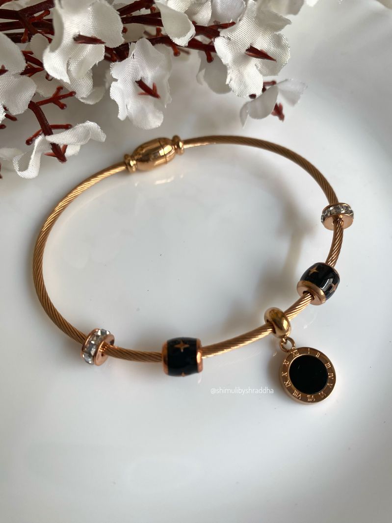 ROMAN BLACK CHARM BRACELET