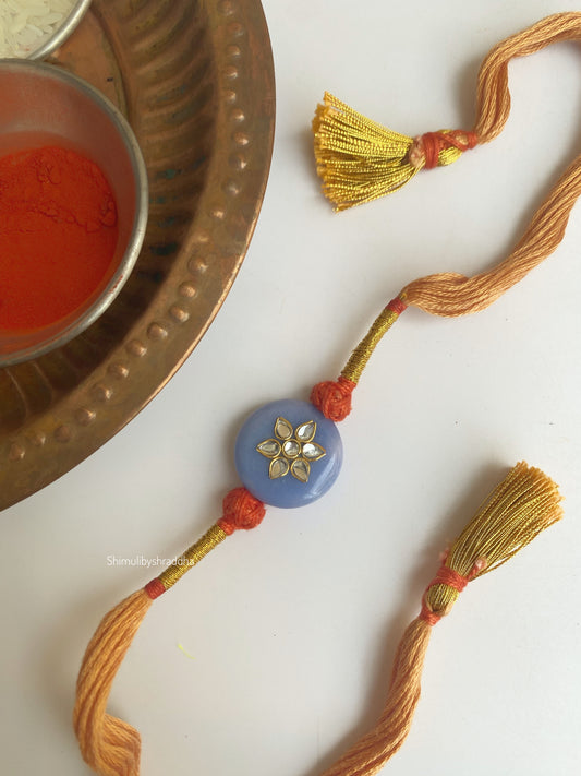 Natural stone rakhi with kundan work