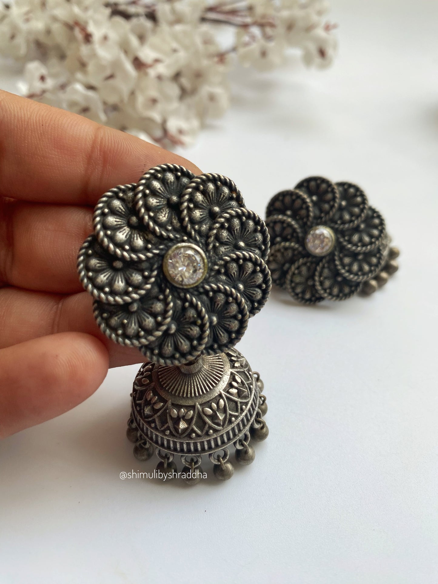 SILVERLOOKALIKE FLOWER JHUMKA