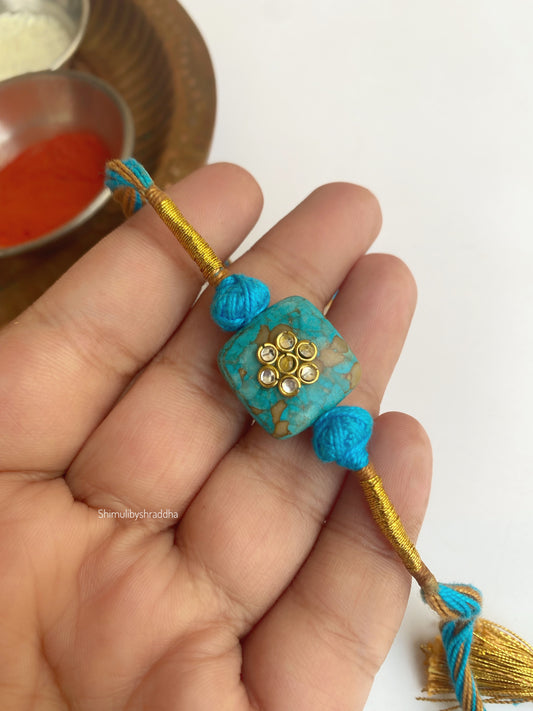 Natural stone rakhi with kundan work