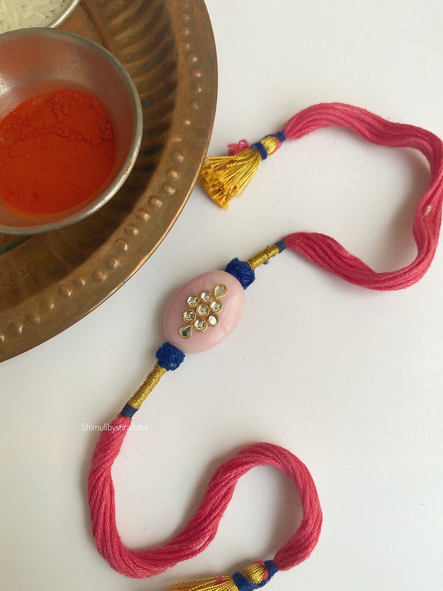 Natural stone rakhi with kundan work