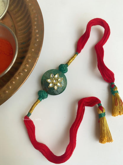 Natural stone rakhi with kundan work