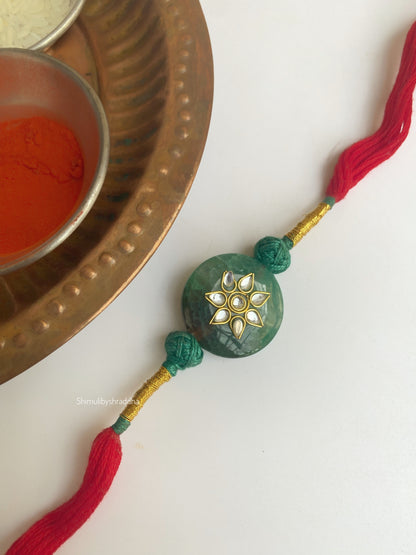 Natural stone rakhi with kundan work