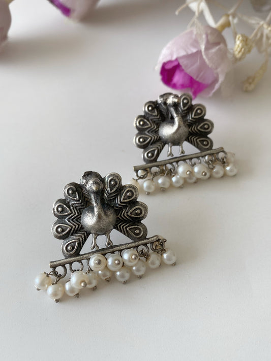 SILVERLOOKALIKE PEACOCK STUDS
